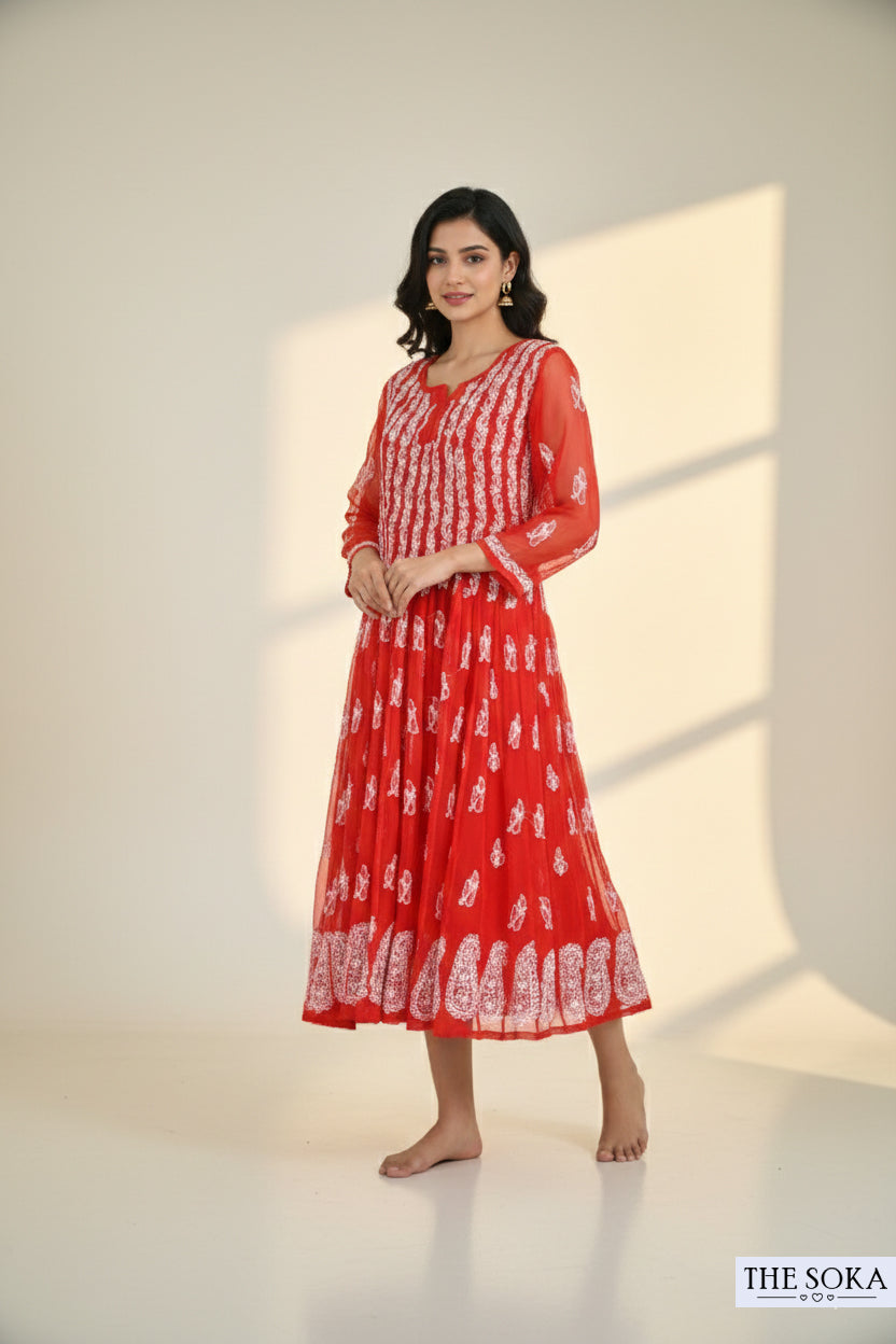 Woman wearing a red and white chikankari kurti